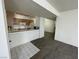 A kitchen with white counters and cabinets flows into the living space at 2725 S Nellis Blvd # 1158, Las Vegas, NV 89121