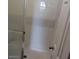 White tiled standing shower with glass doors at 2725 S Nellis Blvd # 1158, Las Vegas, NV 89121