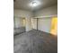Spacious bedroom with carpeted floors and a mirrored closet at 2995 E Sunset Rd # 237, Las Vegas, NV 89120