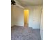Neutral bedroom featuring wall-to-wall carpet and white trim at 2995 E Sunset Rd # 237, Las Vegas, NV 89120