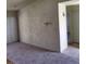 Open living room features a smooth painted wall and access to the kitchen at 2995 E Sunset Rd # 237, Las Vegas, NV 89120