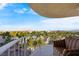 Relaxing balcony features comfortable seating area with views of the city and mountains at 3111 Bel Air Dr # 7F, Las Vegas, NV 89109