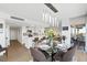 Bright dining area open to the kitchen featuring a glass table at 3111 Bel Air Dr # 7F, Las Vegas, NV 89109