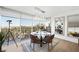 Dining room with floor to ceiling windows offering expansive city views at 3111 Bel Air Dr # 7F, Las Vegas, NV 89109