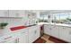 Bright kitchen featuring stainless steel appliances, white cabinetry, and an expansive view at 3111 Bel Air Dr # 7F, Las Vegas, NV 89109