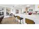 Kitchen featuring an island with seating and stainless steel appliances at 3111 Bel Air Dr # 7F, Las Vegas, NV 89109