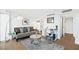 Bright living room featuring modern decor, hard wood floors, and a view to the entrance at 3111 Bel Air Dr # 7F, Las Vegas, NV 89109