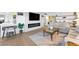 Cozy living area with a modern fireplace and TV, plus comfortable sofas and stylish decor at 3111 Bel Air Dr # 7F, Las Vegas, NV 89109