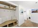 Inviting mudroom with custom bench seating, wood accents and plenty of storage at 3111 Bel Air Dr # 7F, Las Vegas, NV 89109