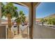 Balcony view of palm trees, parking and a mountain in a desert setting at 3320 Cactus Shadow St # 201, Las Vegas, NV 89129