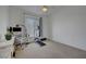 Bedroom featuring desk, office chair and plenty of natural light at 3320 Cactus Shadow St # 201, Las Vegas, NV 89129