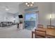 Open concept dining area featuring a sliding glass door that leads to a private outdoor space at 3320 Cactus Shadow St # 201, Las Vegas, NV 89129