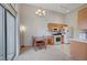 Bright dining area with modern lighting, seamlessly connecting to the adjacent kitchen at 3320 Cactus Shadow St # 201, Las Vegas, NV 89129