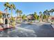Gated community entrance with palm trees, providing security and curb appeal at 3320 Cactus Shadow St # 201, Las Vegas, NV 89129