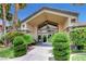 Inviting entrance featuring modern doors, large window, and well-manicured landscaping, creating a welcoming first impression at 3320 Cactus Shadow St # 201, Las Vegas, NV 89129