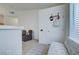 Entryway with neutral color scheme, tile floors, and an adjacent sitting area at 3320 Cactus Shadow St # 201, Las Vegas, NV 89129