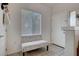 Neutral entryway featuring a window and bench with tile flooring at 3320 Cactus Shadow St # 201, Las Vegas, NV 89129
