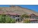Apartment complex with well-maintained grounds, red tile roofs, and mountain views at 3320 Cactus Shadow St # 201, Las Vegas, NV 89129