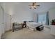 Spacious main bedroom featuring high ceiling, ceiling fan and plenty of natural light at 3320 Cactus Shadow St # 201, Las Vegas, NV 89129