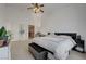 Spacious main bedroom featuring high ceiling, ceiling fan and ensuite bath at 3320 Cactus Shadow St # 201, Las Vegas, NV 89129