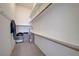 Spacious walk-in closet with multiple shelves and clothing rods for ample storage at 3320 Cactus Shadow St # 201, Las Vegas, NV 89129