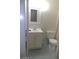 Well-lit bathroom featuring a vanity, mirror, toilet, and a shower with a sliding door at 3435 Villa Knolls South Dr, Las Vegas, NV 89120