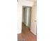 Bedroom featuring wood flooring and an open doorway, providing easy access to the rest of the house at 3435 Villa Knolls South Dr, Las Vegas, NV 89120