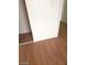 Bedroom featuring wood flooring and an closet with sliding doors, offering ample storage space at 3435 Villa Knolls South Dr, Las Vegas, NV 89120