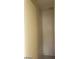 Bright hallway offers seamless transition between rooms with neutral walls and simple design at 3435 Villa Knolls South Dr, Las Vegas, NV 89120