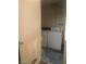 Functional laundry room equipped with a washer and dryer, providing convenience for home chores at 3435 Villa Knolls South Dr, Las Vegas, NV 89120