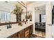 Bright bathroom with double sinks, modern fixtures, and a large mirror at 3473 Conough Ln, Las Vegas, NV 89129