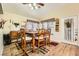 Cozy dining area with natural light and wood furniture at 3473 Conough Ln, Las Vegas, NV 89129