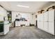 Spacious garage with ample storage cabinets and laundry area at 3473 Conough Ln, Las Vegas, NV 89129