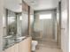 Modern bathroom boasts a glass shower, sleek fixtures, and a stylish vanity at 3510 Cosima Ln, Las Vegas, NV 89120