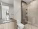 Stylish bathroom with double sinks and modern glass shower at 3510 Cosima Ln, Las Vegas, NV 89120