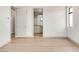 Inviting bedroom featuring hardwood floors and ensuite bathroom at 3510 Cosima Ln, Las Vegas, NV 89120