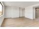 Bright bedroom with walk-in shower and sleek hardwood floors at 3510 Cosima Ln, Las Vegas, NV 89120