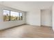 Bright bedroom features large windows and light wood flooring at 3510 Cosima Ln, Las Vegas, NV 89120