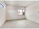 This spacious bedroom is bright with natural light and has modern, neutral decor at 3510 Cosima Ln, Las Vegas, NV 89120