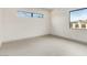 Bright bedroom features a large window providing natural light and modern neutral paint at 3510 Cosima Ln, Las Vegas, NV 89120