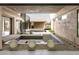 Stunning courtyard featuring a pool, spiral staircase, and modern desert landscaping at 3510 Cosima Ln, Las Vegas, NV 89120