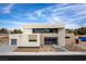 Contemporary two-story home boasts sleek design, desert landscaping, and a two-car garage at 3510 Cosima Ln, Las Vegas, NV 89120