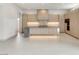 Spacious kitchen features sleek cabinets, a large island, and modern appliances at 3510 Cosima Ln, Las Vegas, NV 89120
