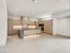 Well-lit modern kitchen features custom cabinets, large island, and ample counter space at 3510 Cosima Ln, Las Vegas, NV 89120