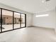 Spacious living room has natural lighting and access to the outdoor area at 3510 Cosima Ln, Las Vegas, NV 89120