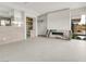 Contemporary living room featuring a fireplace and access to an outdoor pool area at 3510 Cosima Ln, Las Vegas, NV 89120