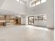 Bright, modern living room with high ceilings and abundant natural light at 3510 Cosima Ln, Las Vegas, NV 89120