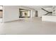 Spacious living area with an open floor plan and access to a serene outdoor space at 3510 Cosima Ln, Las Vegas, NV 89120