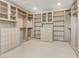Large walk-in closet features custom built-in shelving and drawers for ample storage at 3510 Cosima Ln, Las Vegas, NV 89120