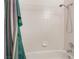 Shower-tub combination with white tile surround at 411 Monmouth Ct, Henderson, NV 89015